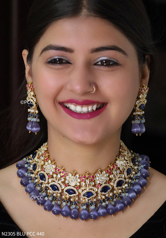 Navratan kundan necklace set with matching Earrings.