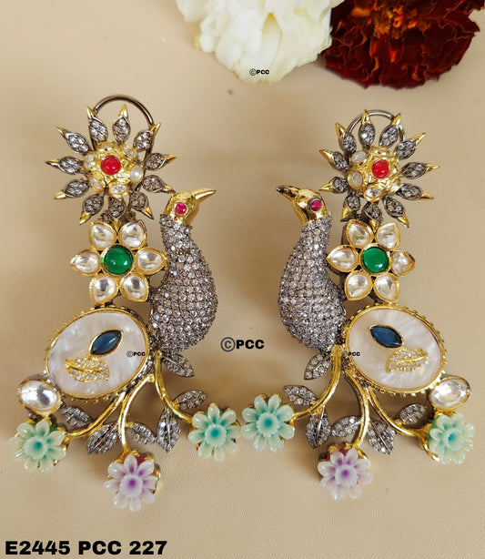 Designer  Earrings featuring mother of pearl