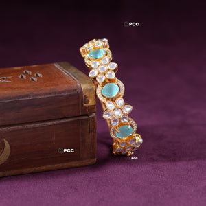 Shine bright with our Kundan Meena Bangle